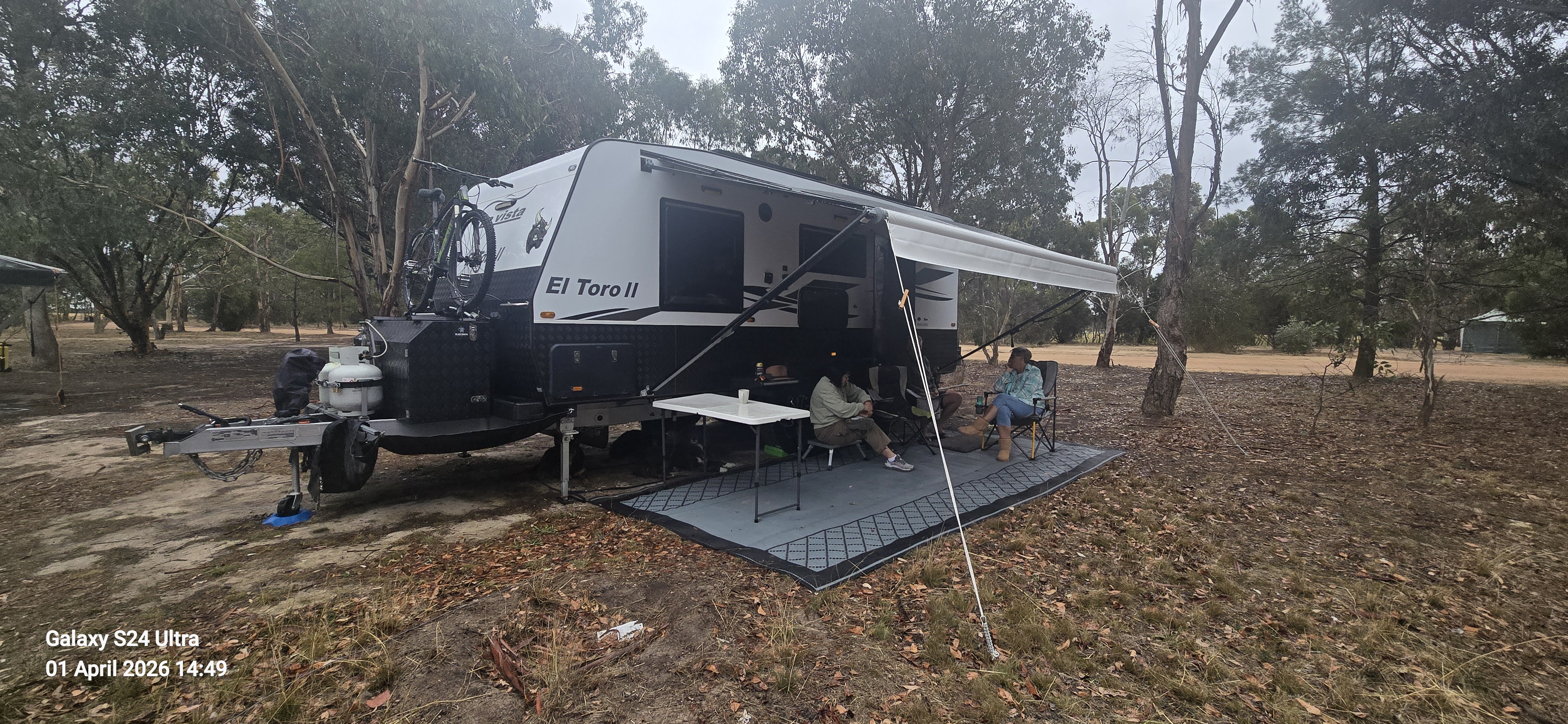 Karen and Stephen camped out beside their caravan, El Toro II